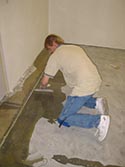 Man Installing Epoxy Floor Sealant
