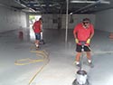 Men Installing an Industrial Concrete Epoxy Floor Coating