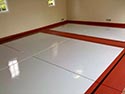 Red and White Concrete Floor Epoxy Coating