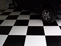 Checkerboard Garage Floor Coating with Car